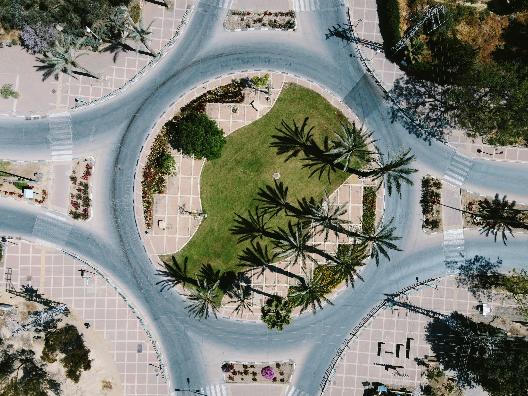 green trees on white round building